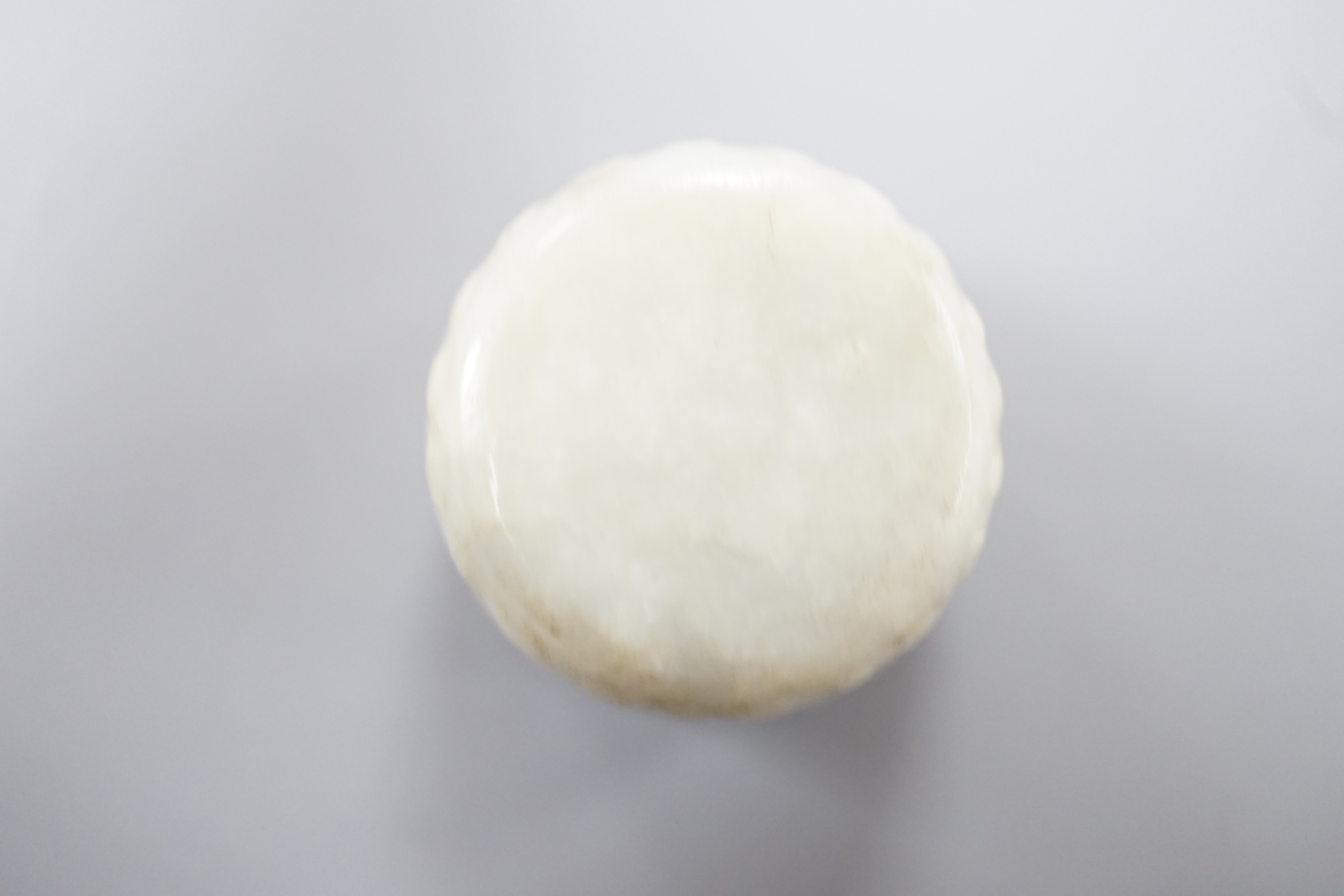 A Chinese jadeite model of a drum, 3 cm diameter